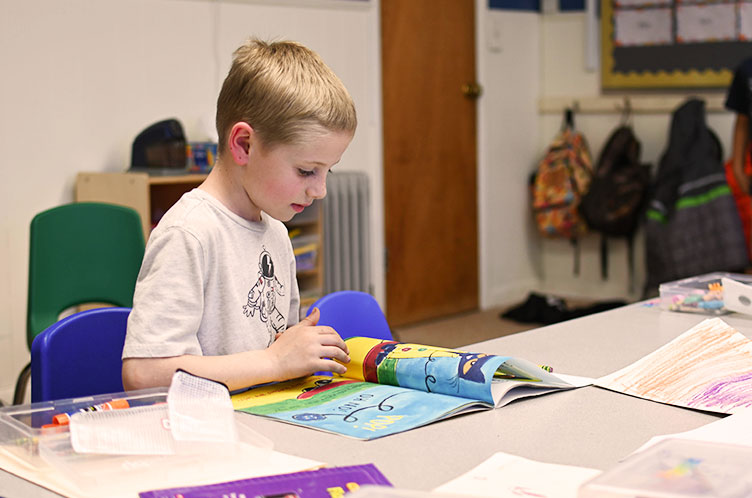 Hillsdale Christian School kindergartener reading